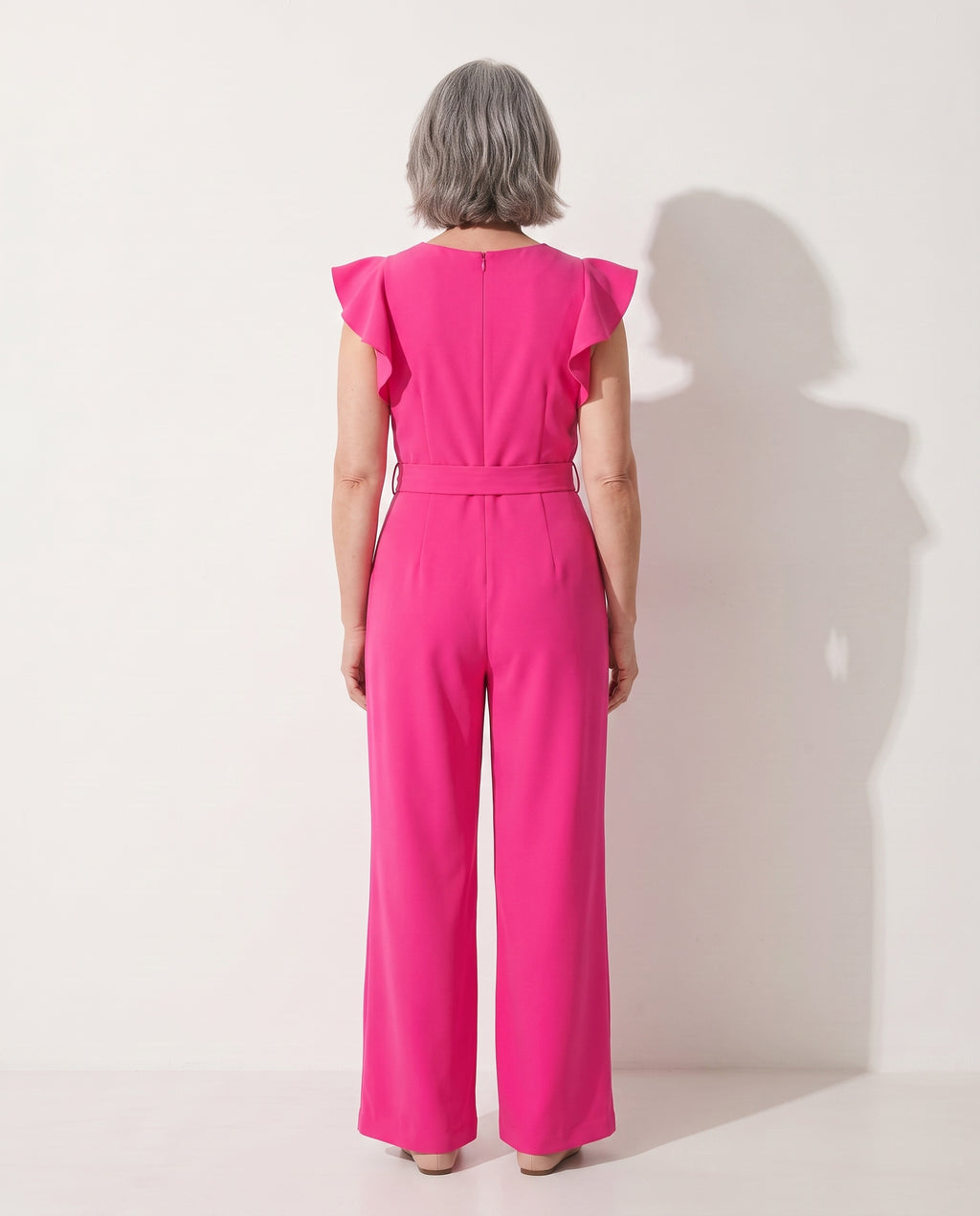 Fleur | Elegant Evening Jumpsuit With Ruffle Tie Waist Detail — achterkant