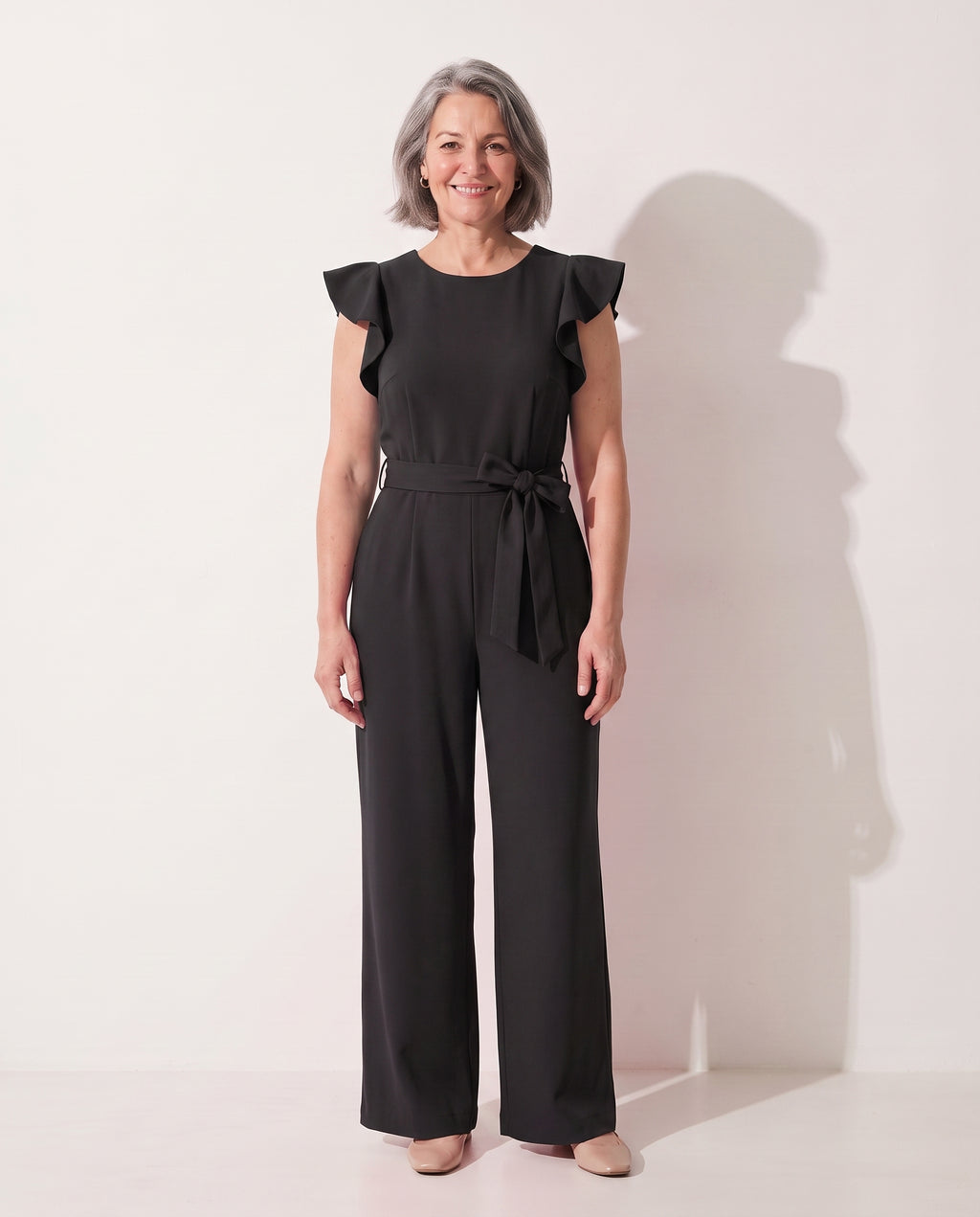 Fleur | Elegant Evening Jumpsuit With Ruffle Tie Waist Detail — Black