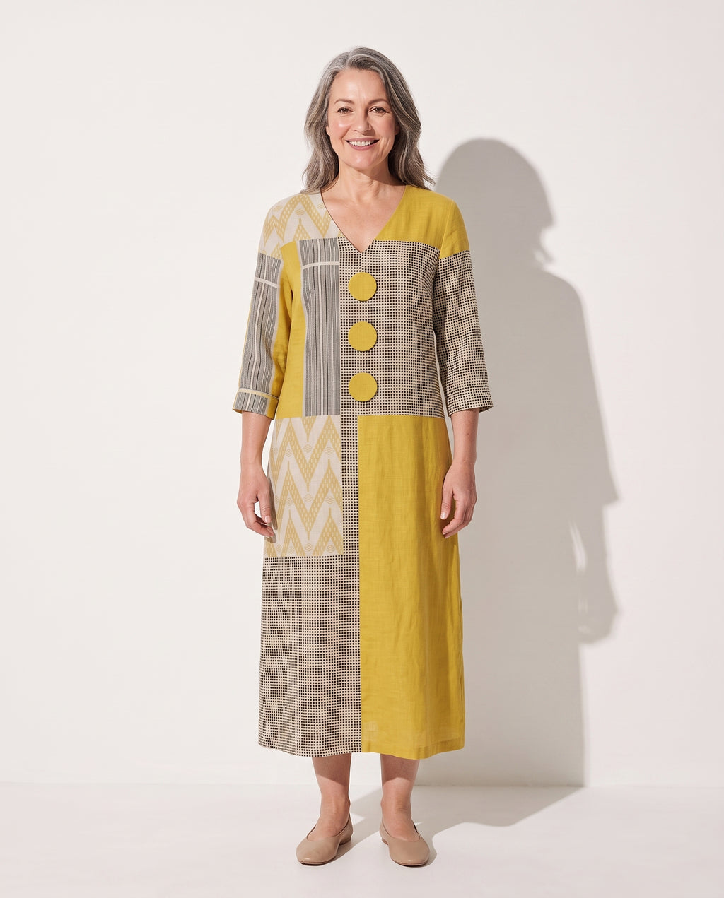 Tamsin | Long Sleeve Patchwork Midi Dress in Bold Geometric Print — voorkant