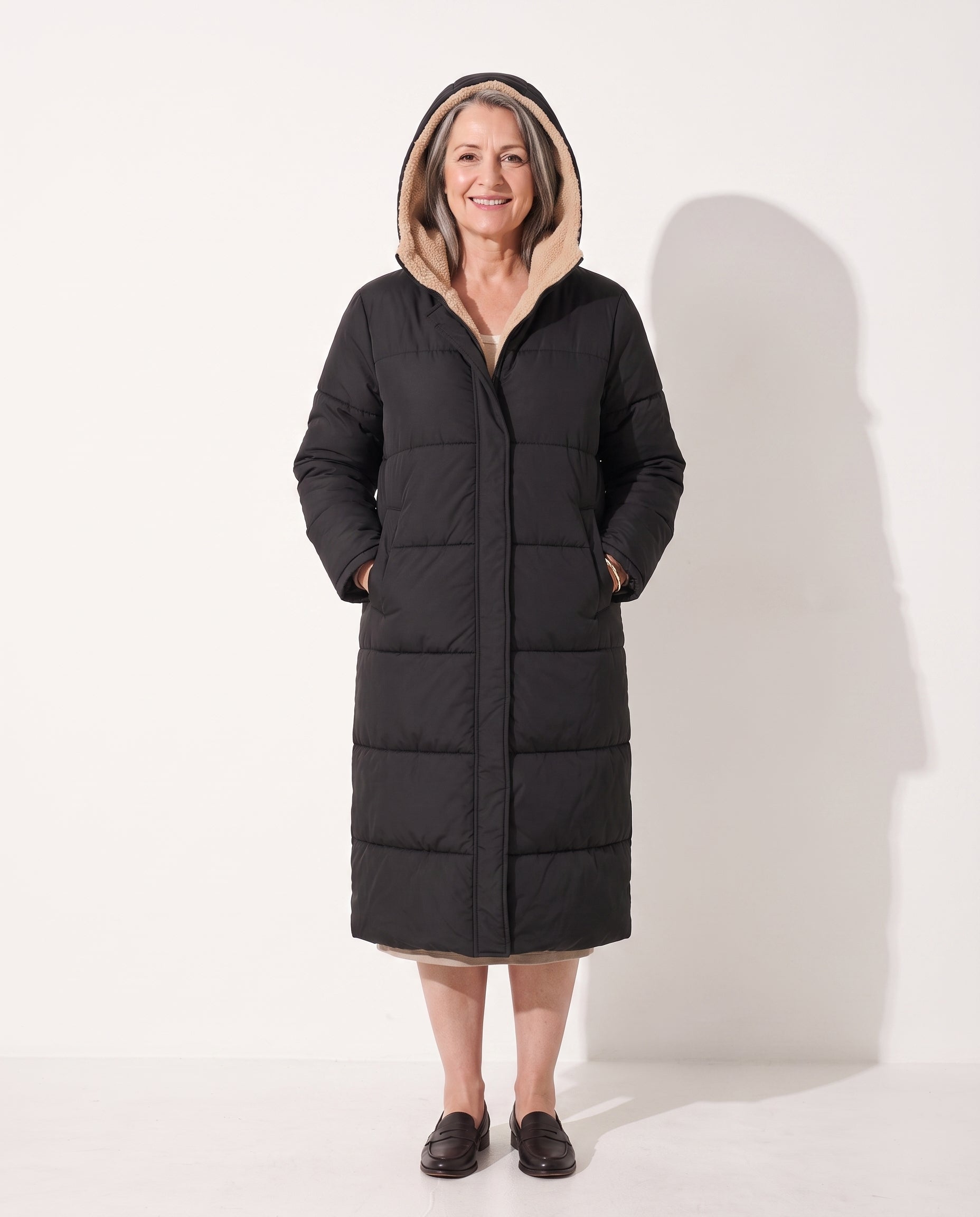 Beatrix | Long Black Quilted Puffer Longline Coat — voorkant