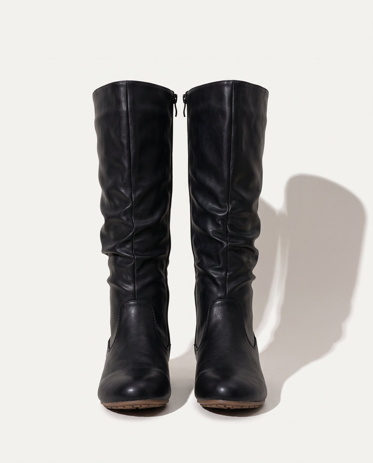 Apolline | Black Knee High Flat Heel Slouchy Boots — voorkant