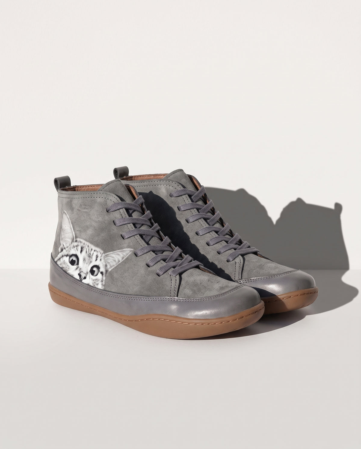 Ursula | Black Brown Heeled Ankle Boots With Cat Print Detail — voorkant