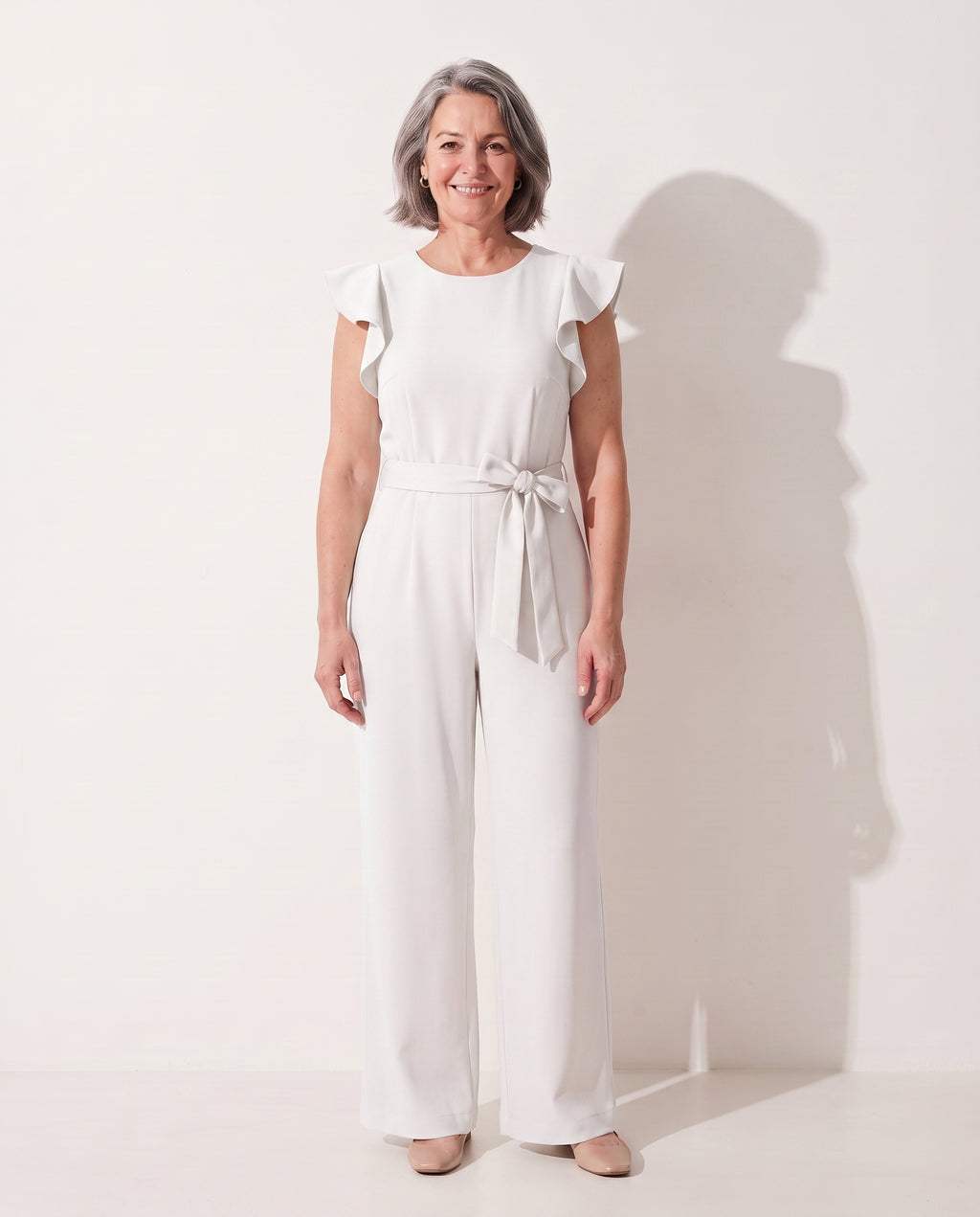 Fleur | Elegant Evening Jumpsuit With Ruffle Tie Waist Detail — White